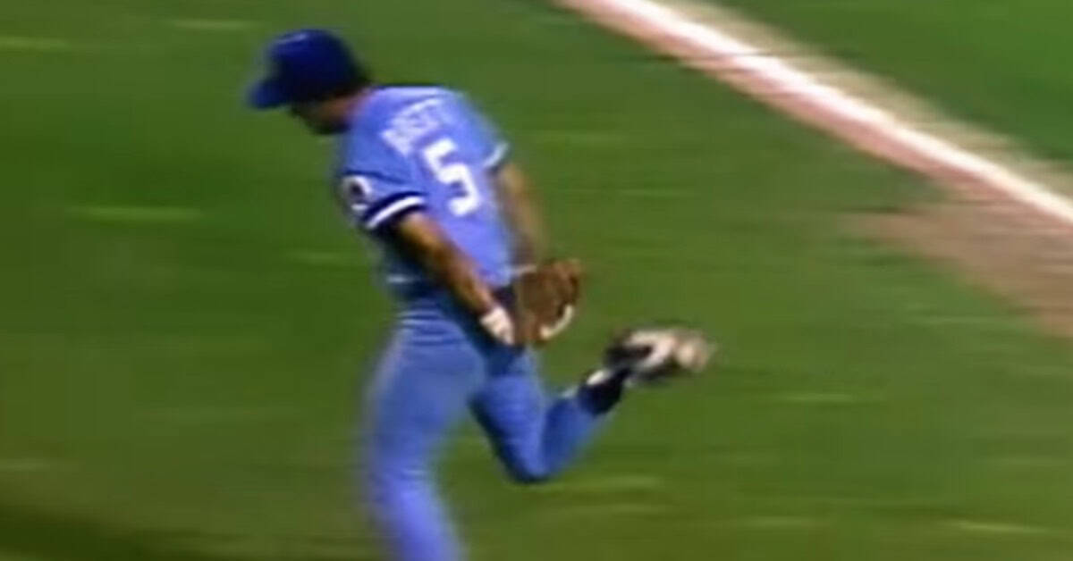 George Brett's Career in Numbers: From 3,000 Hits to MVP 9 George Brett fielding the ball, showcasing skills from his .390 season in the '80s.
