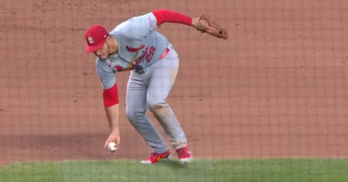 Who's Knocking on Cooperstown's Door Right Now? 13 Nolan Arenado showcasing his defensive skills, pivotal for potential Hall of Fame status.