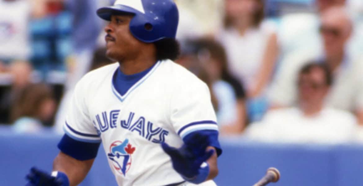 Jesse Barfield in action, showcasing his powerful arm that defined his legacy with the Blue Jays.